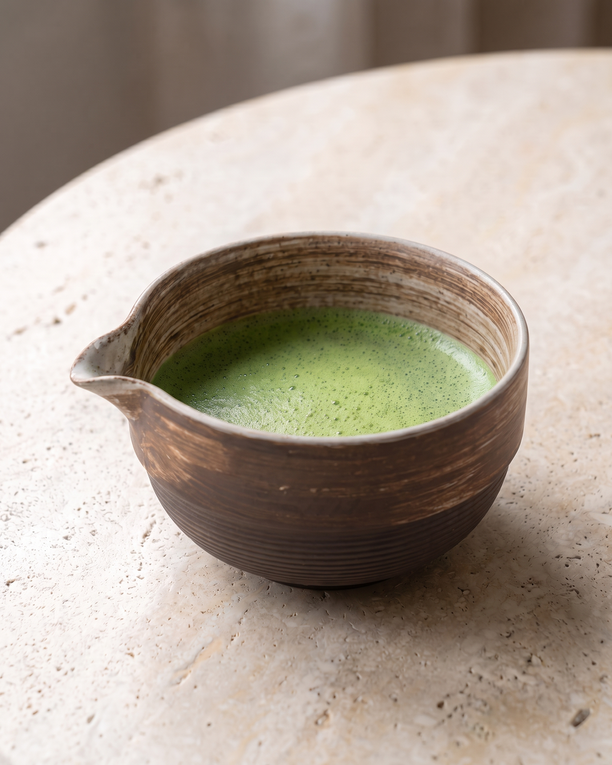 In use: Stoneware Matcha Bowl 500 ml – Amber, filled with freshly whisked matcha