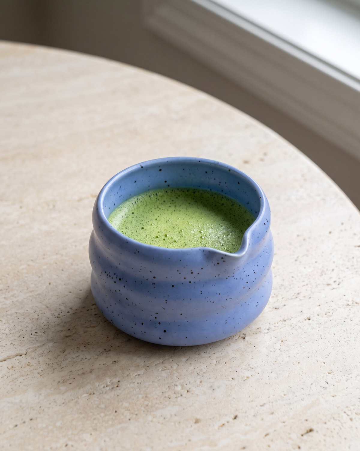 In use: Speckled Ceramic Matcha Bowl – Blue, filled with freshly whisked matcha