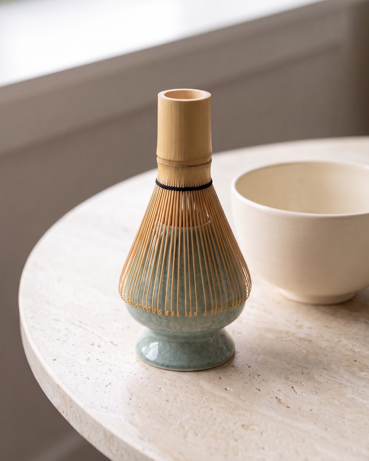 In use: Crackle Ceramic Whisk Holder – Sage, bamboo whisk resting prongs-down on the holder to dry