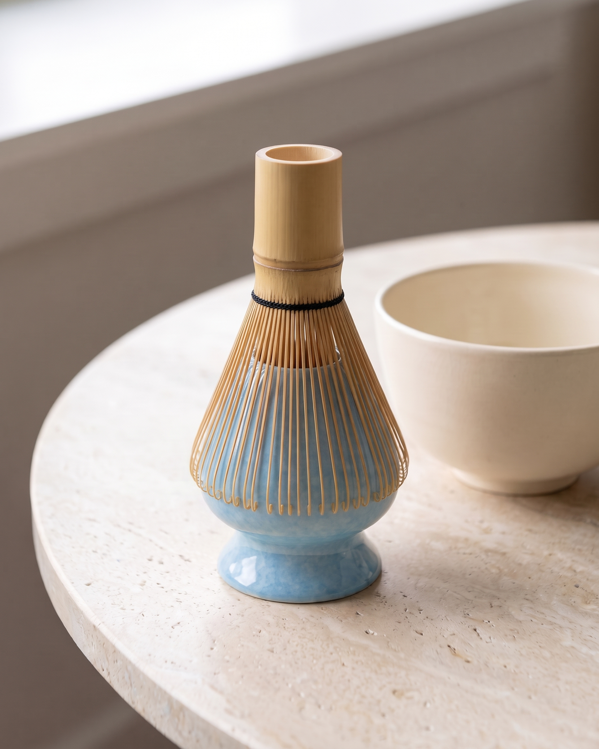 In use: Crackle Ceramic Whisk Holder – Sky Blue, bamboo whisk resting prongs-down on the holder to dry
