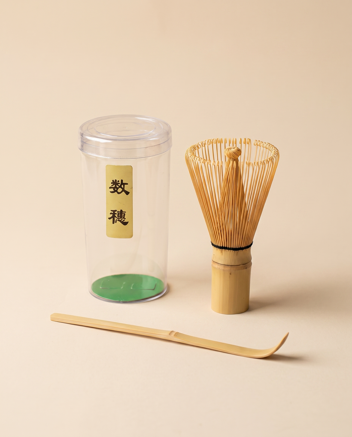What arrives: whisk in protective tube, bamboo scoop and holder, as packed