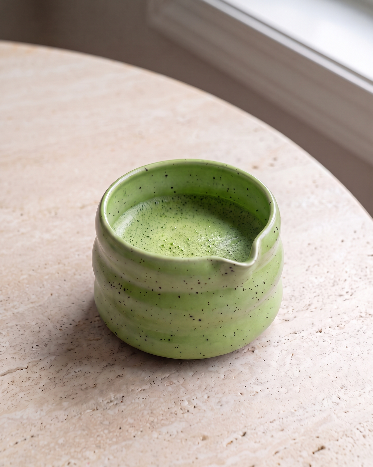 In use: Speckled Ceramic Matcha Bowl – Green, filled with freshly whisked matcha